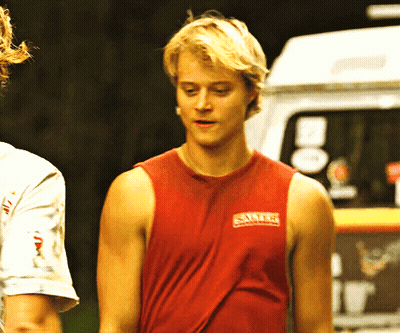 Man In Red Tank Top Saying Santos GIF