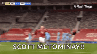 Man In Red Teamviewer Jersey On Soccer Field GIF