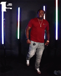 Man In Red Tees Do The Milly Rock GIF