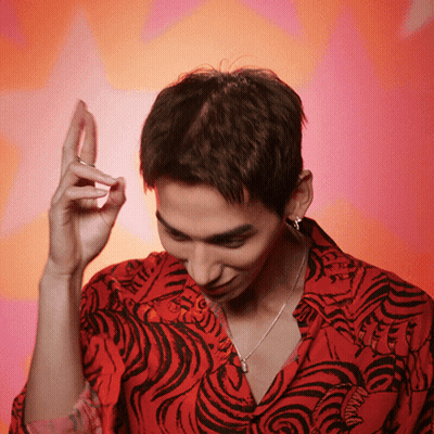 Man In Red Tiger Print Shirt And Necklace GIF
