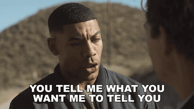 Man In Red Tommy Jeans Shirt Talking On Cell Phone GIF