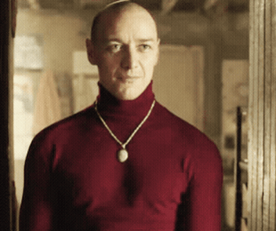 Man In Red Turtleneck And Necklace GIF