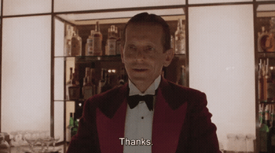Man In Red Tuxedo Says Thanks GIF