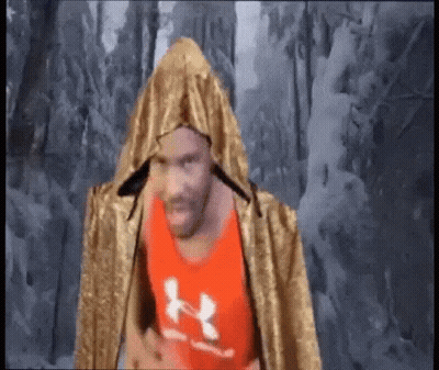 Man In Red Under Armour Tank Top And Gold Cape GIF