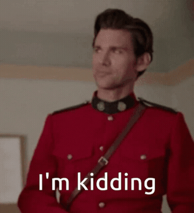 Man In Red Uniform Saying I'm Kidding GIF