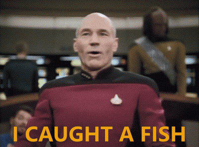 Man In Red Uniform Says I Caught A Fish GIF