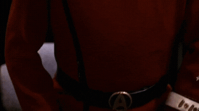 Man In Red Uniform With Medal GIF