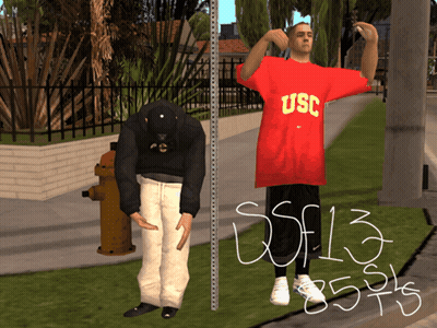 Man In Red USC Shirt Next To Man In Black Hat GIF