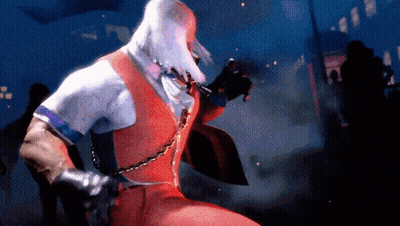 Man In Red Vest Holding Chain Around Neck GIF