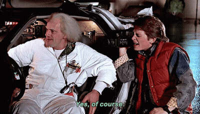 Man In Red Vest Saying Yes Of Course In Car GIF
