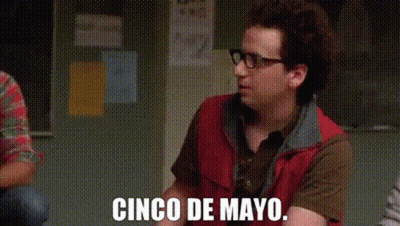 Man In Red Vest Talking Cinco De Mayo GIF