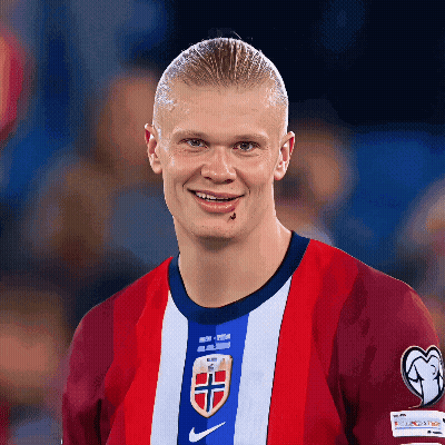 Man In Red White And Blue Nike Shirt Smiling GIF