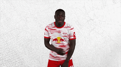 Man In Red White And Blue Shirt With Red Bull GIF