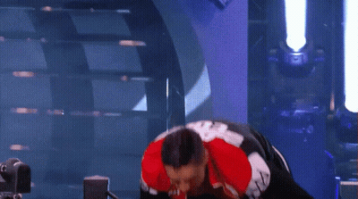 Man In Red White Black Jacket And Shorts GIF
