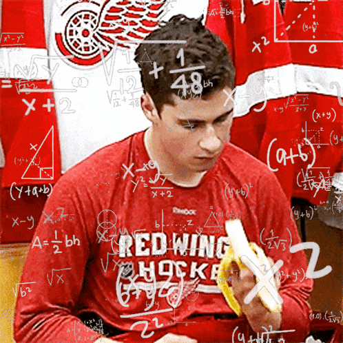 Man In Red Wing Hockey Shirt Eating Banana GIF