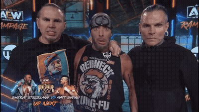 Man In Redneck Shirt With Two Men GIF