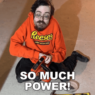 Man In Reese's Sweatshirt Kneeling GIF