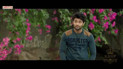 Man In Roadster Shirt With Pink Flowers GIF