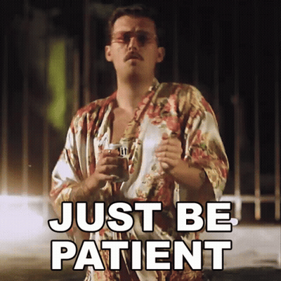 Man In Robe Holding Beer Saying Just Be Patient GIF