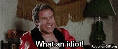 Man In Robe Sitting In Chair Smiling GIF