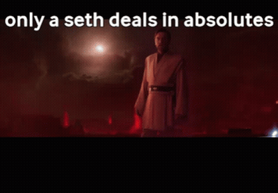 Man In Robe Standing In Dark Room GIF