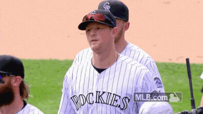 Man In Rockies Jersey On Field GIF