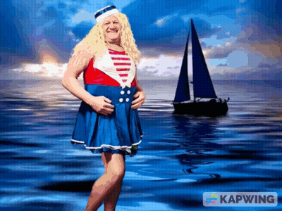Man In Sailor Costume In Front Of Boat GIF