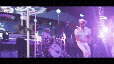 Man In Sailor Hat Dancing On Stage GIF