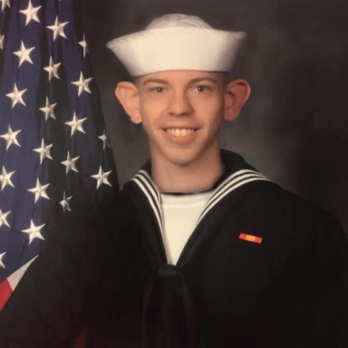 Man In Sailor Uniform Smiling GIF