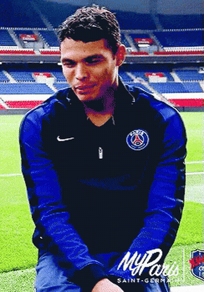 Man In Saint-Germain Shirt Sitting On Grass GIF