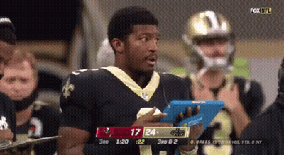 Man In Saints Jersey Holding Tablet GIF