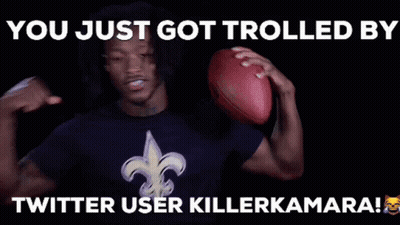 Man In Saints Shirt Holding Football Thumbs Up GIF