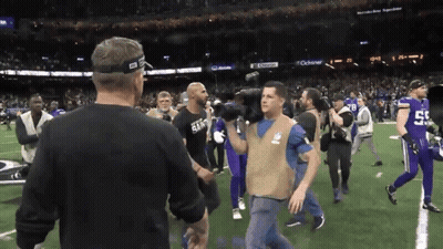 Man In Saints Shirt Walking On Field GIF