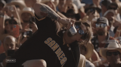 Man In San Diego Jersey Drinking Beer GIF