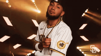 Man In San Diego Padres Jersey Facing Spotlight GIF