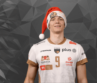Man In Santa Hat And Plus Shirt GIF