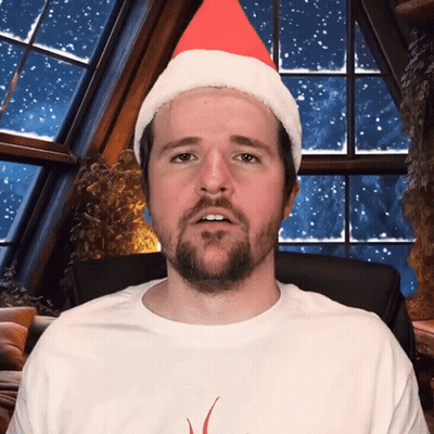 Man in Santa Hat and White Shirt