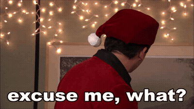 Man In Santa Hat Asking Excuse Me What GIF