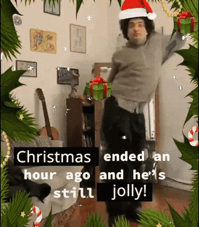 Man In Santa Hat Dancing At Christmas GIF