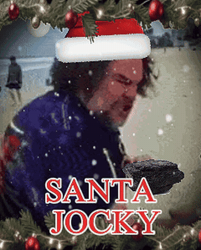 Man In Santa Hat Holding Coal Santa Jockey GIF