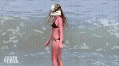 Man In Santa Hat With Christmas Decorations Saying Jolly Monster GIF