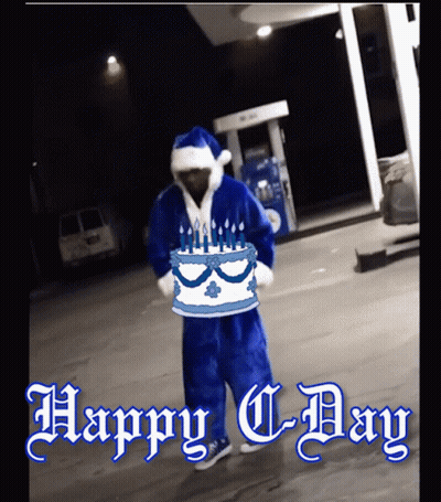 Man In Santa Suit Holding Birthday Cake Saying Happy C Day GIF