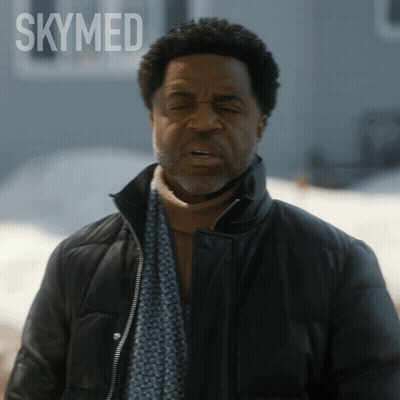 Man In Scarf And Jacket With Skymed GIF