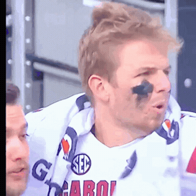 Man In Scarf And SEC Shirt GIF