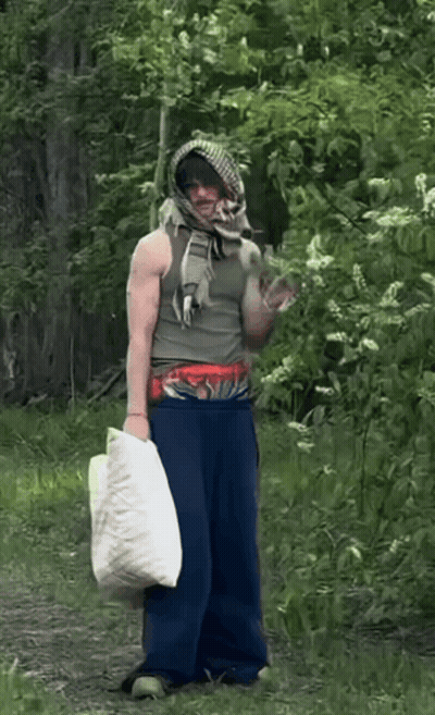 Man In Scarf Holding Moncler Bag GIF