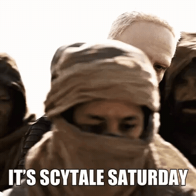 Man In Scarf In Crowd Saying It's Scytale Saturday GIF