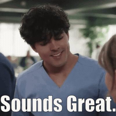 Man In Scrub Top Smiling Saying Sounds Great GIF