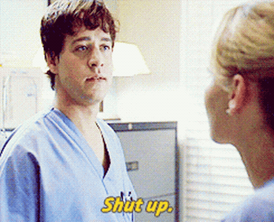Man In Scrubs Telling Woman Shut Up GIF