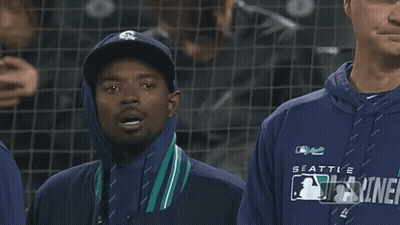 Man In Seattle Mariners Sweatshirt Smiling GIF