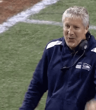 Man In Seattle Seahawks Jacket On Football Field GIF